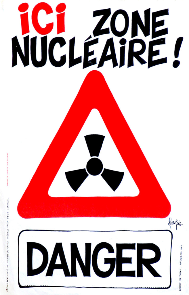 Ici zone nucléaire ! Danger. Affiche symbolisant les danger du nucléaire, produite par l’asbl « 22 mars », regroupant militant.e.s antinucléaire, s.d.s.l.